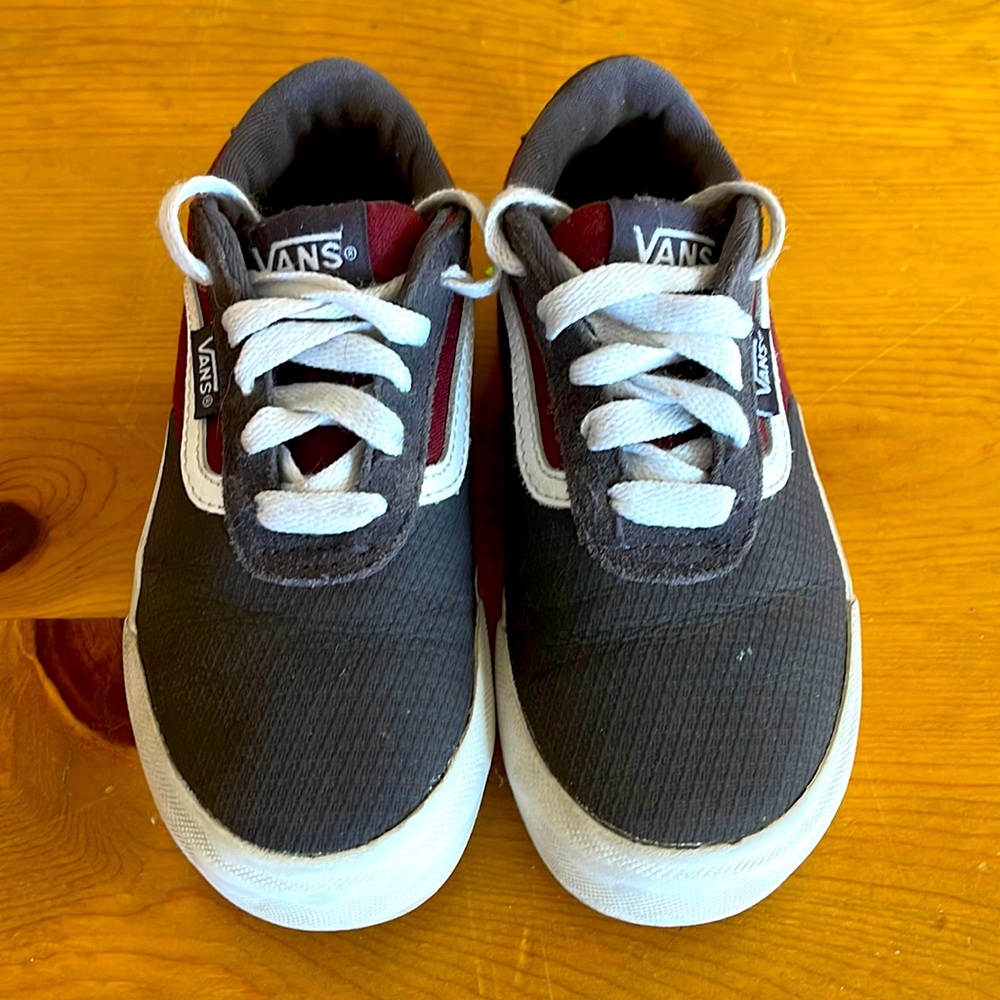 Gray and maroon Vans with white details.